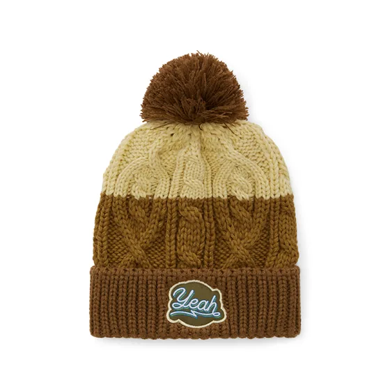 Gorro trenzado con puño de canalé y pompón. · MW1021